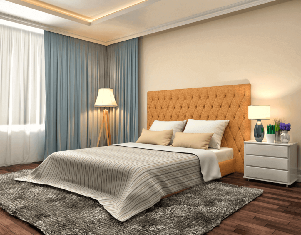 A bedroom with a silk and velvet curtain in colors white and blue-green in an elegant dedsign