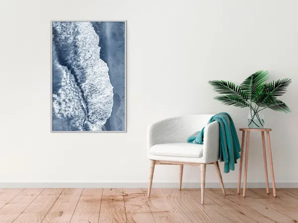 A wall painting with a picture of an ocean blue