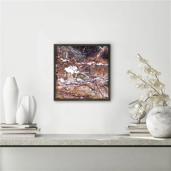 An image of a marble wall art hanged on the wall.