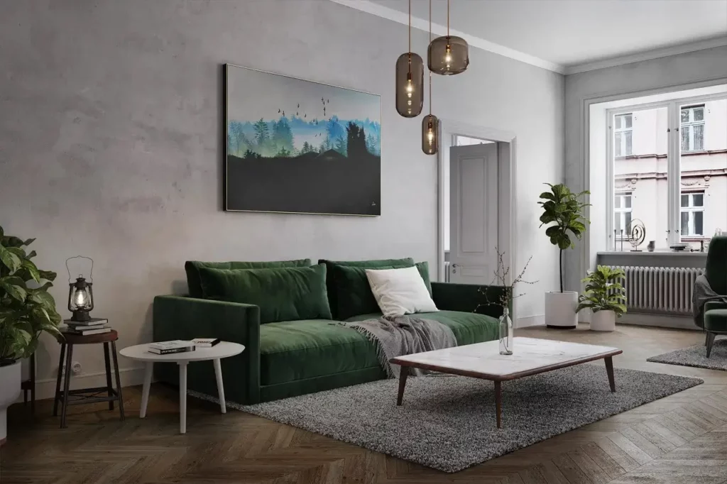 A living room area with a landscape painting in color black, blue and white.