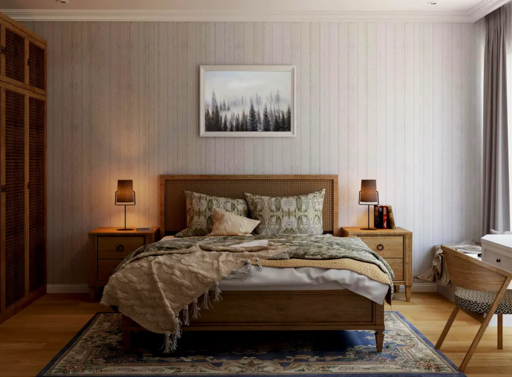 A bedroom with a lampshades on the side and a small wall picture hanged on the wall.